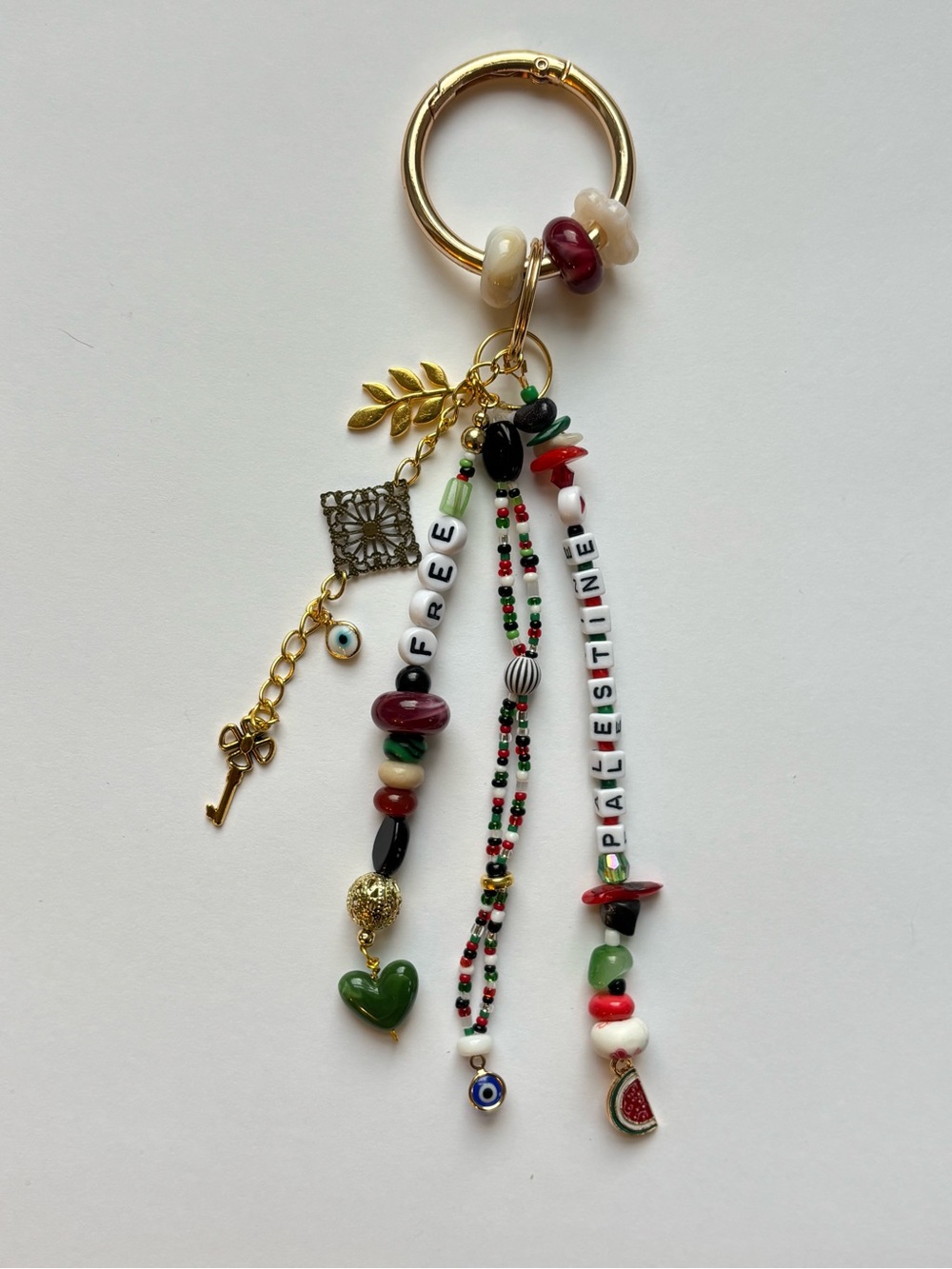 Gold Ring Keychain with Multicolor Bead Tassels